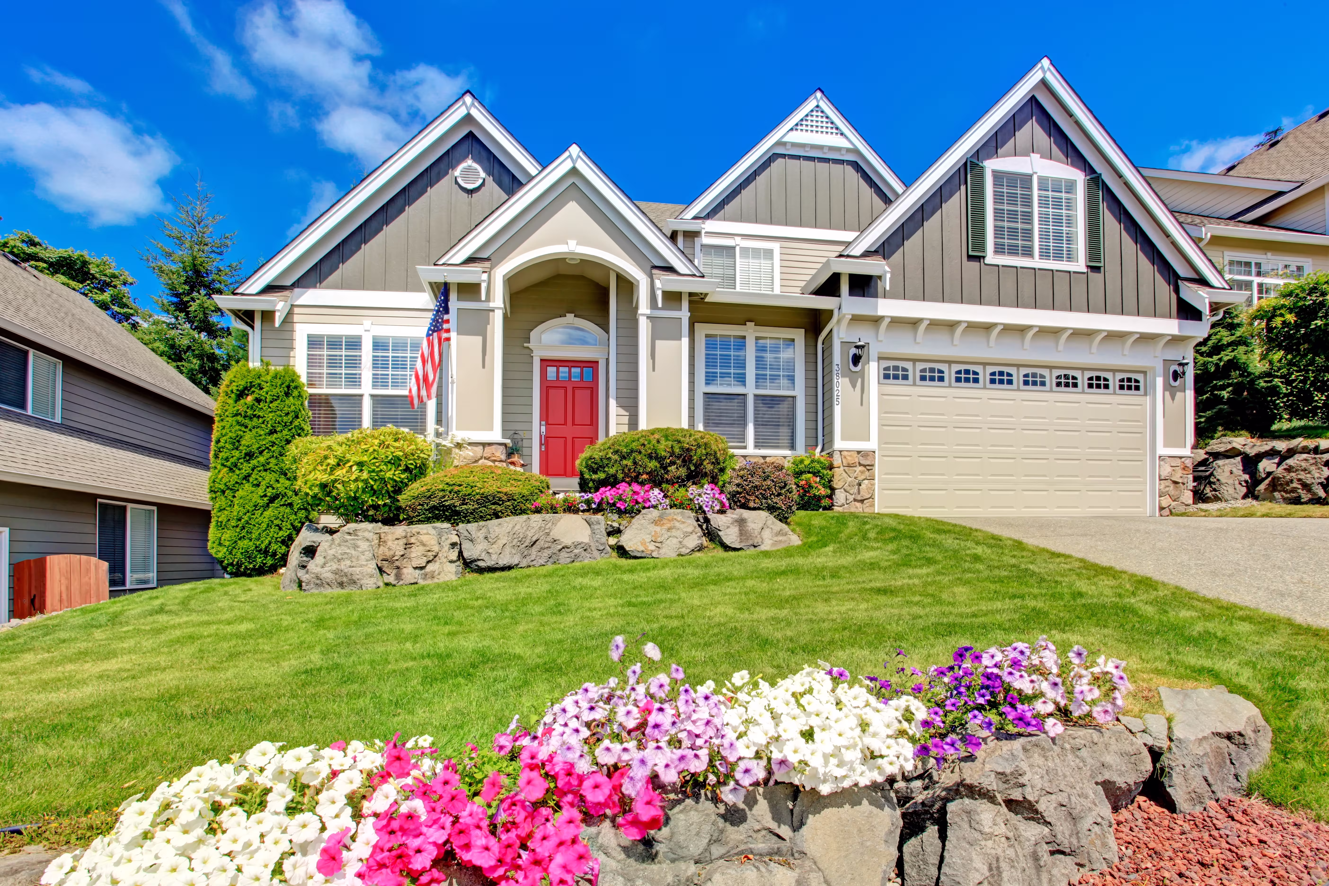 Downloaded FILE #: 69285003 American house with beautiful landscape and vivid flowers