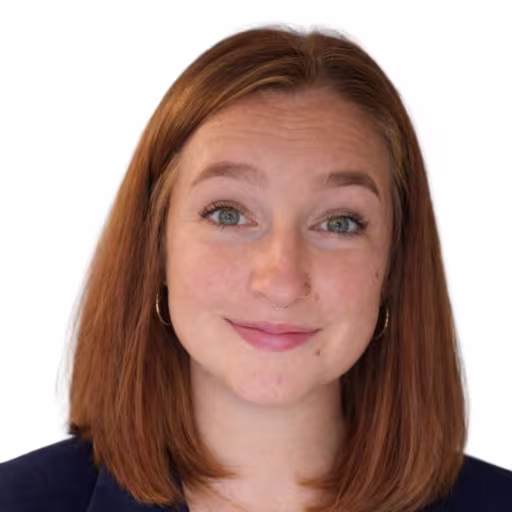 headshot of Alesha Parsons, wearing a blazer with a white shirt