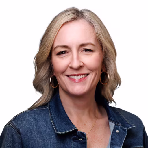 headshot of Ashley Hoehn, wearing a jean button up shirt