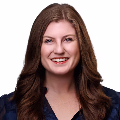 headshot of Blaire Laudermilk, wearing a dark blue blouse