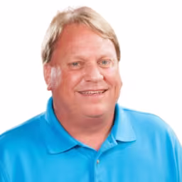 headshot of Dave Rorabeck, wearing a blue polo
