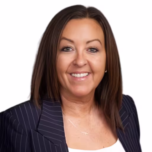 headshot of Emily Rowe, wearing a striped blazer and a white shirt