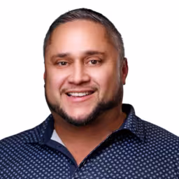 headshot of Francisco Valdes, wearing a dark blue polo