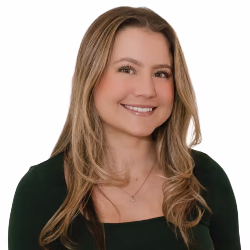 Headshot of Haley Pietraniec wearing black shirt with white background