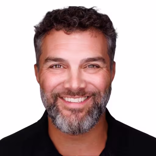 Headshot for Joe Onofre, wearing a black shirt