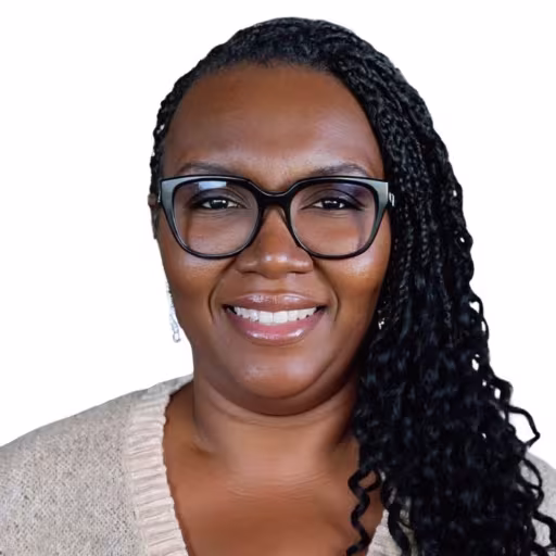 headshot of Kendra Nunnally, wearing a white shirt