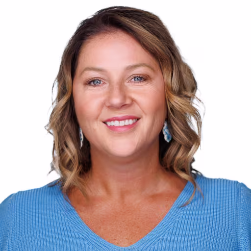 headshot for Ronda Bouse, wearing a light blue shirt.