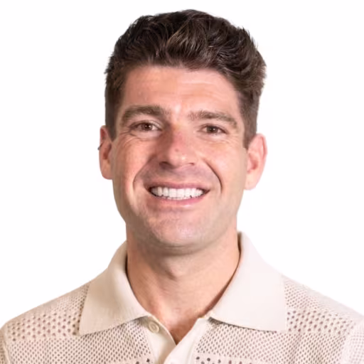Headshot of Sean casper wearing a tan polo shirt