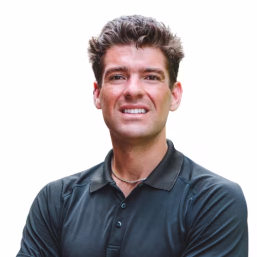 headshot of Sean Casper, weraing a grey polo