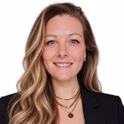 headshot of Shayna Green, wearing a black shirt