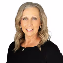 headshot of Sherry Dougherty, wearing a black shirt