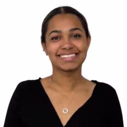 headshot of Suzan Hunt, wearing a black shirt