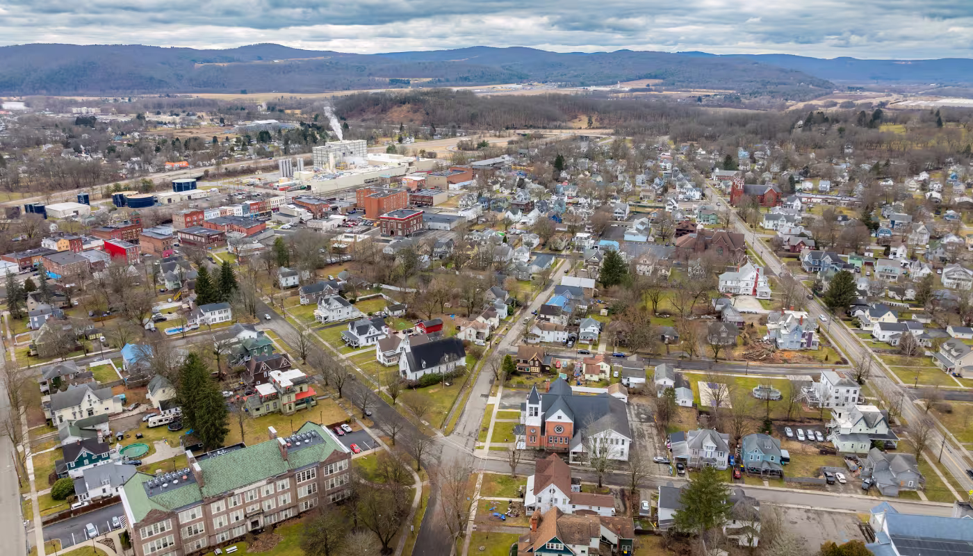 Waverly, NY, USA - 03-03-2024 - Cloudy winter aerial image of the downtown area in the Village of Waverly, NY.