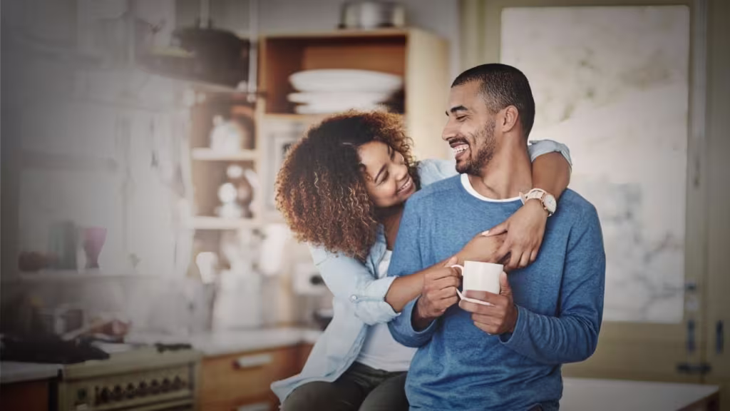 Happiness, man and woman embrace with affection, romance and young people in apartment.