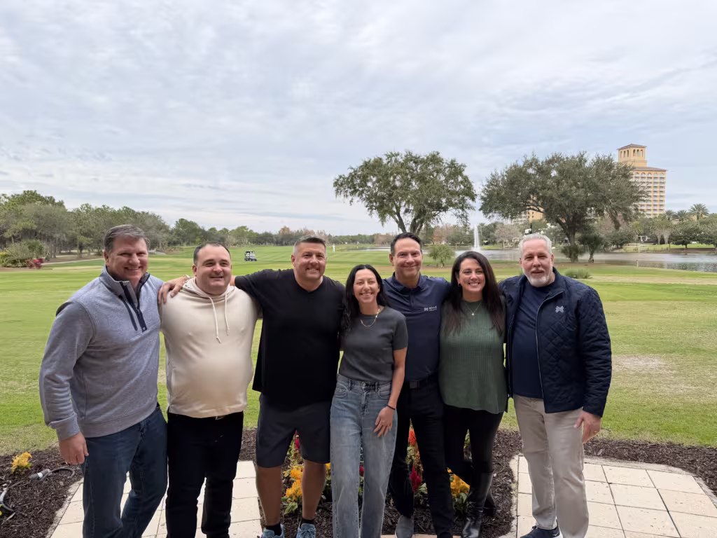 group photo at a golf course