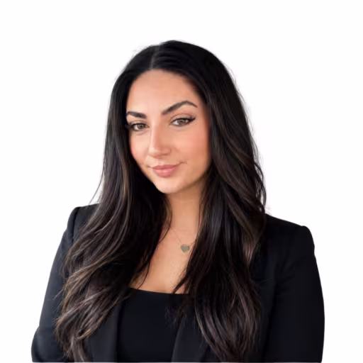 Headshot of Kylie Wadley wearing black shirt with black suit coat