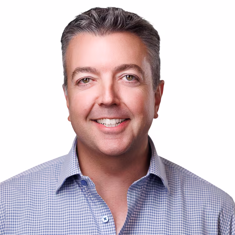 headshot of Novus CEO Eric Egenhoefer, wearing a light blue shirt